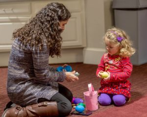 Child opening Easter Eggs